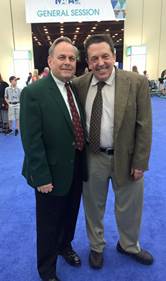 AAPSM President Alex Kor, DPM congratulates David Craig on his induction into the NATA Hall of Fame